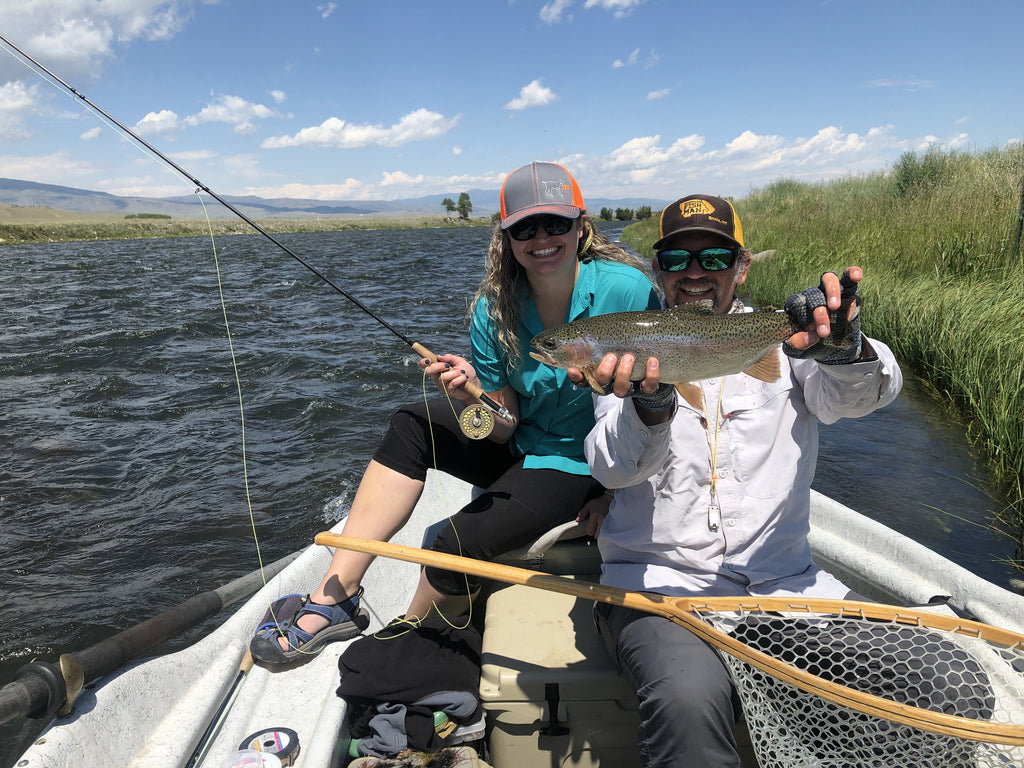 Showing off a beautiful rainbow trout caught on a recent guided fly fishing trip on the Madison River near Ennis Montana.  