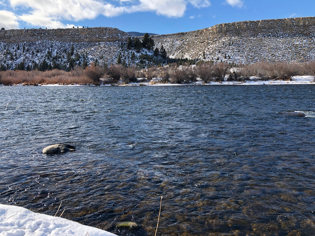 Looking across the Madison River at the Palisades during a recent fly fishing trip near Ennis, Montana.