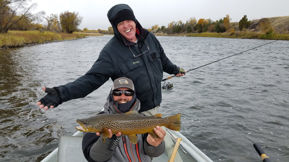 Big Madison River Brown trout caught on spin fishing tackle during a guided float fishing trip on the Upper Madison near Ennis, Montana.